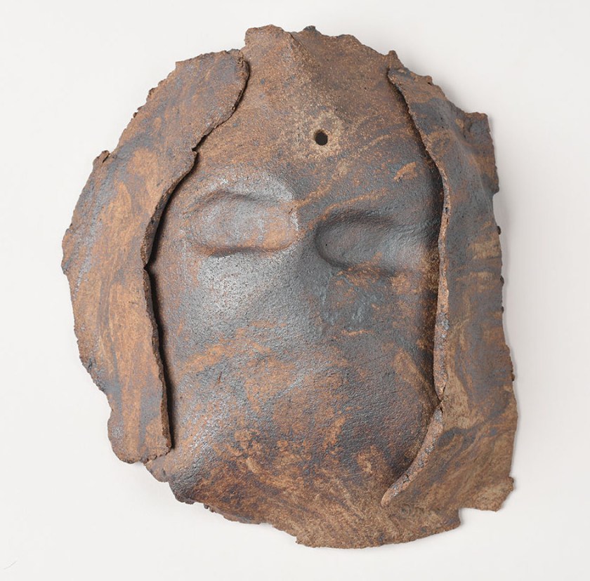 small mask, white St Thomas clay with oxide, reduction fired. 21x19cm